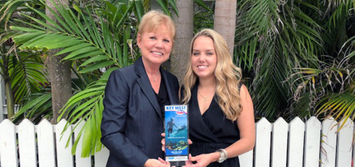 Barbara presents brochure award to Fury Watersports